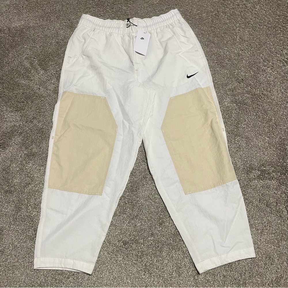 Nike White Track Pants with Beige Patch Panels